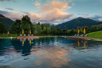 Der Thermalwasserbadesee in den Alpenthermen Gastein. • © Alpentherme Gastein, Fotoatelier Wolkersdorfer